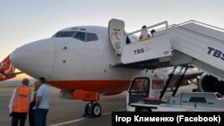 Шестьдесят пять депортированных из России украинцев, застрявших на границе в Грузии, вернулись на родину
